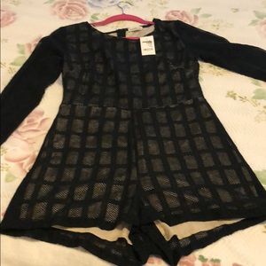 Sexy Caged design romper. New with tags!